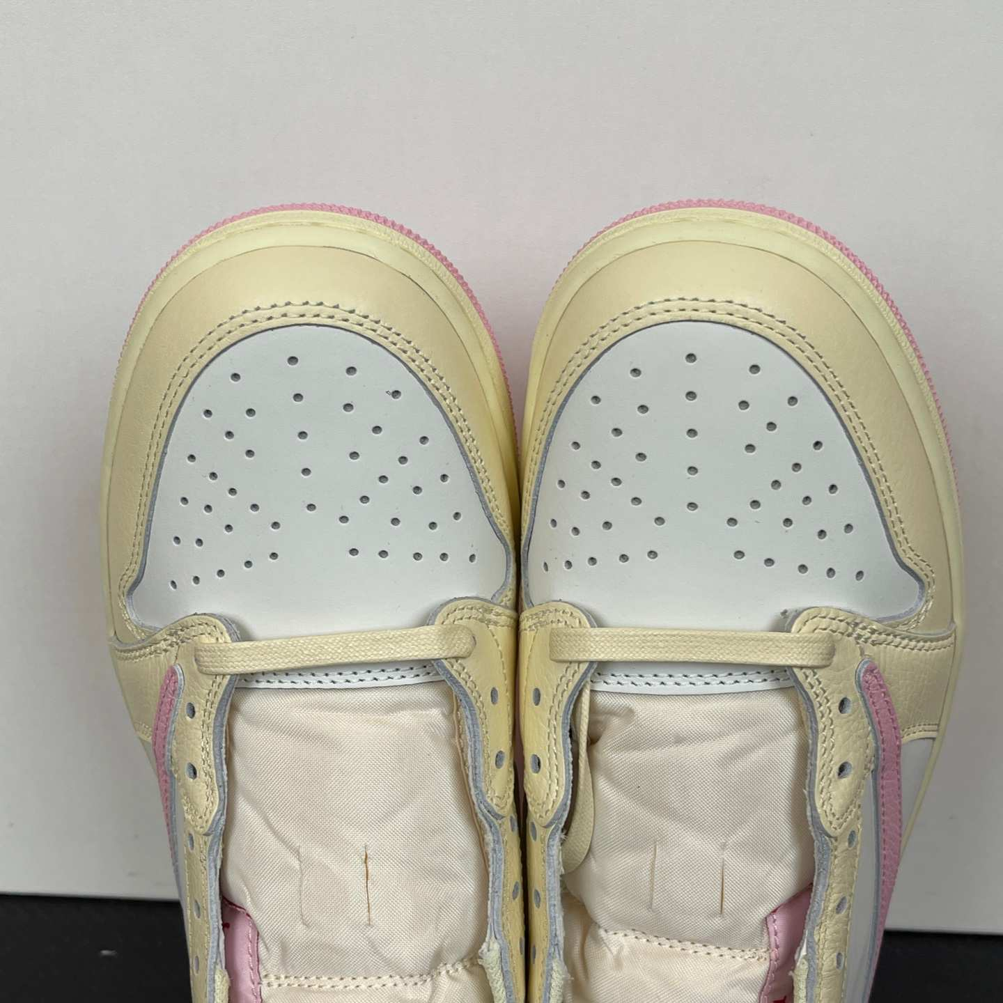 Travis Scott x Air Jordan 1 Low OG SP “Sail Pink” Reverse Swoosh Low-Top Sneakers