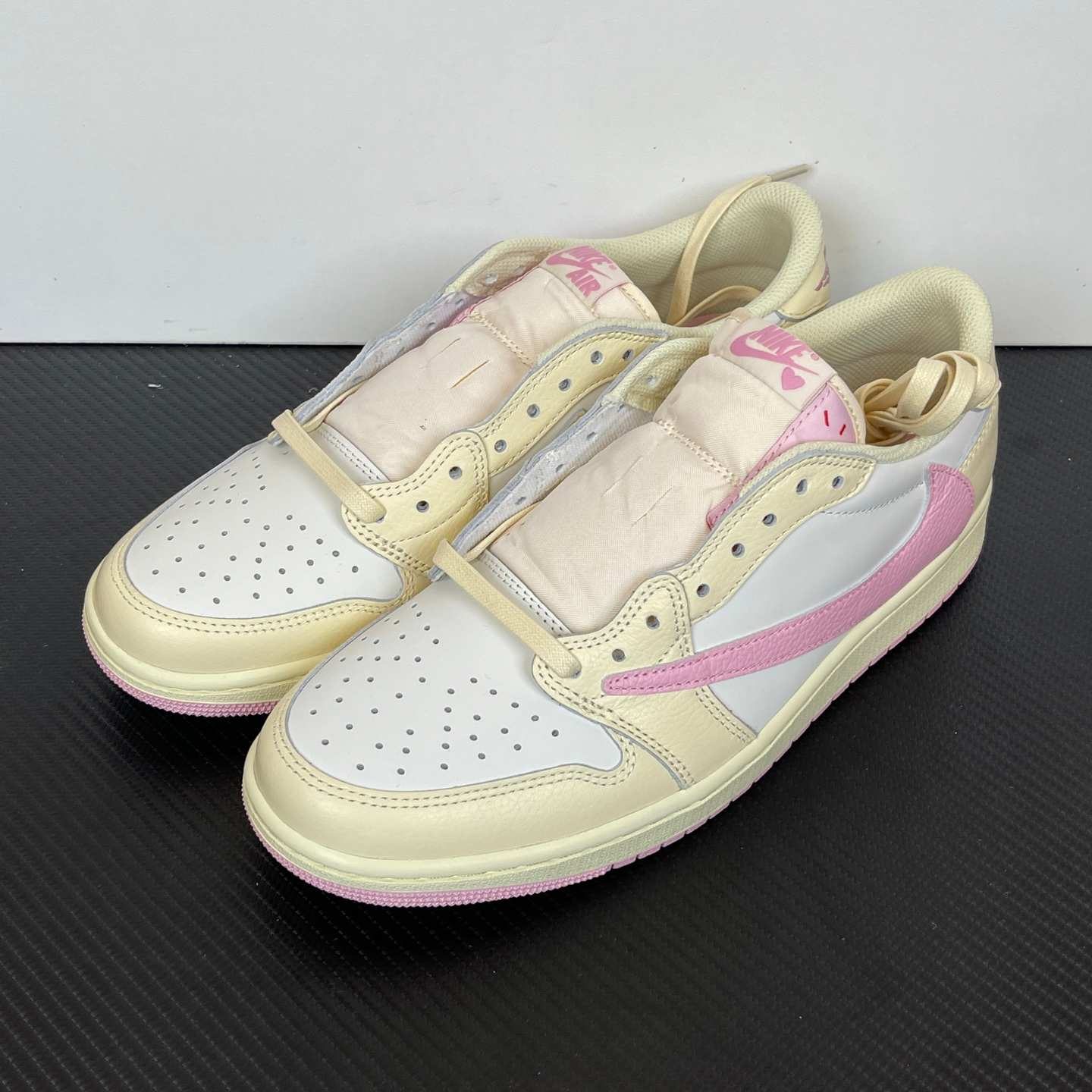 Travis Scott x Air Jordan 1 Low OG SP “Sail Pink” Reverse Swoosh Low-Top Sneakers