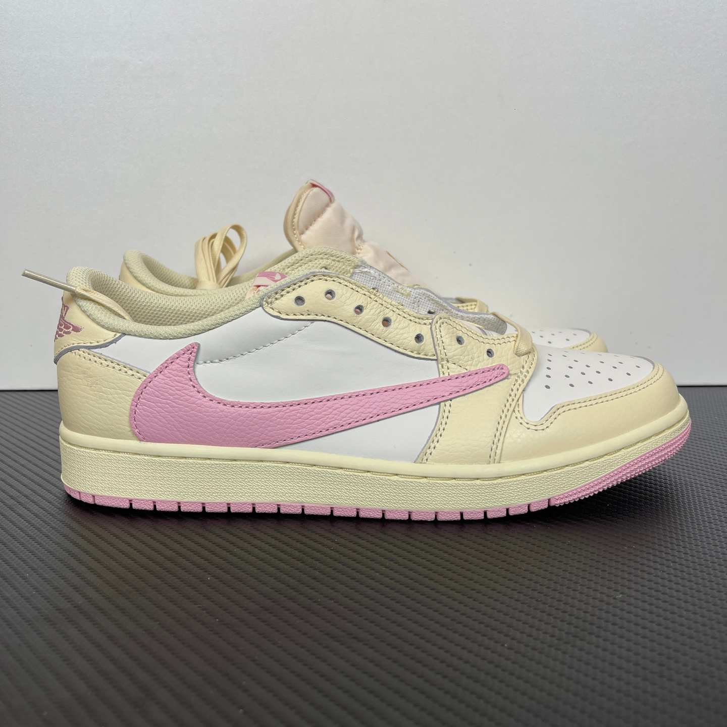 Travis Scott x Air Jordan 1 Low OG SP “Sail Pink” Reverse Swoosh Low-Top Sneakers