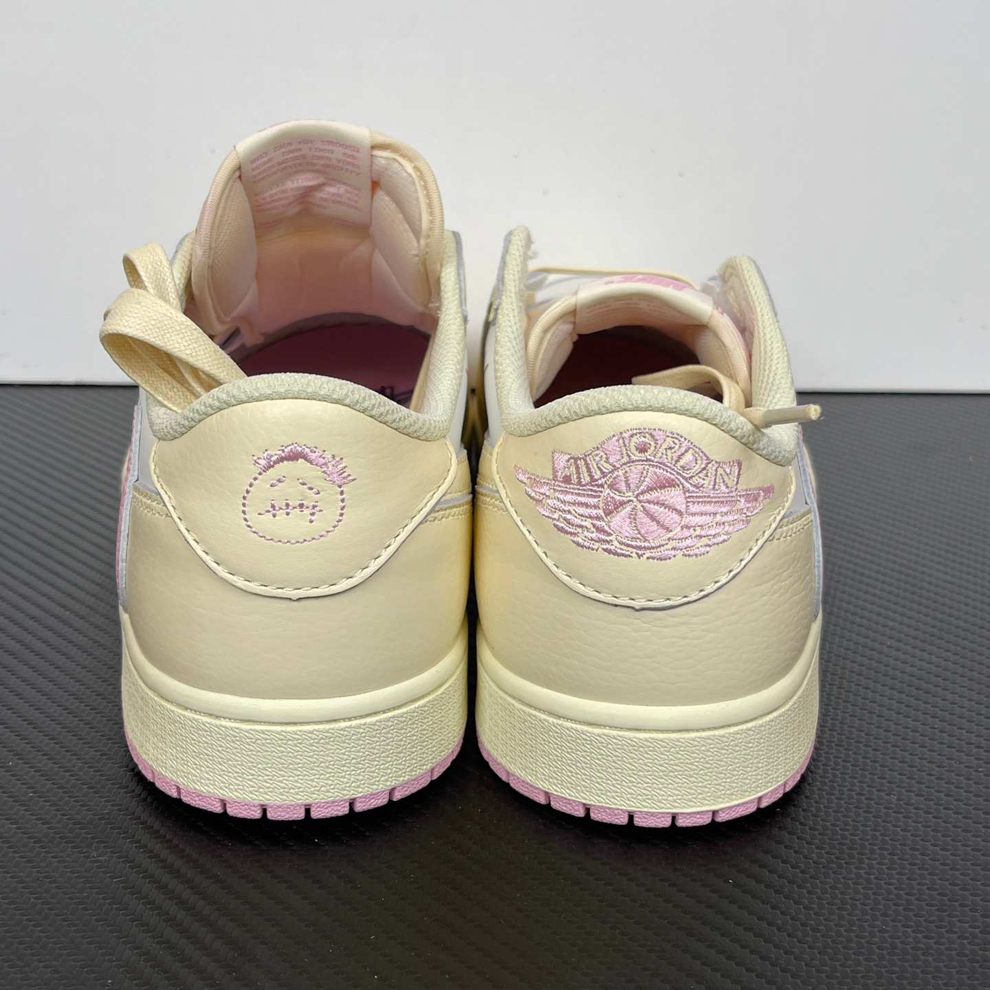 Travis Scott x Air Jordan 1 Low OG SP “Sail Pink” Reverse Swoosh Low-Top Sneakers