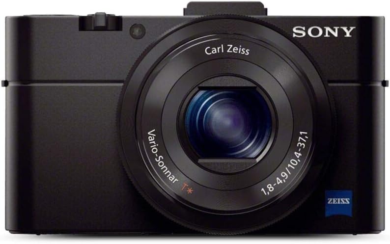 Sony RX100 II Premium Kompaktkamera - 20 MP CMOS Sensor und 3,6 fach optischer Zoom - Zeiss Objektiv 28 bis 100 mm mit F1,8 bis F4,9 - WLAN NFC Schwarz-Nestmyio