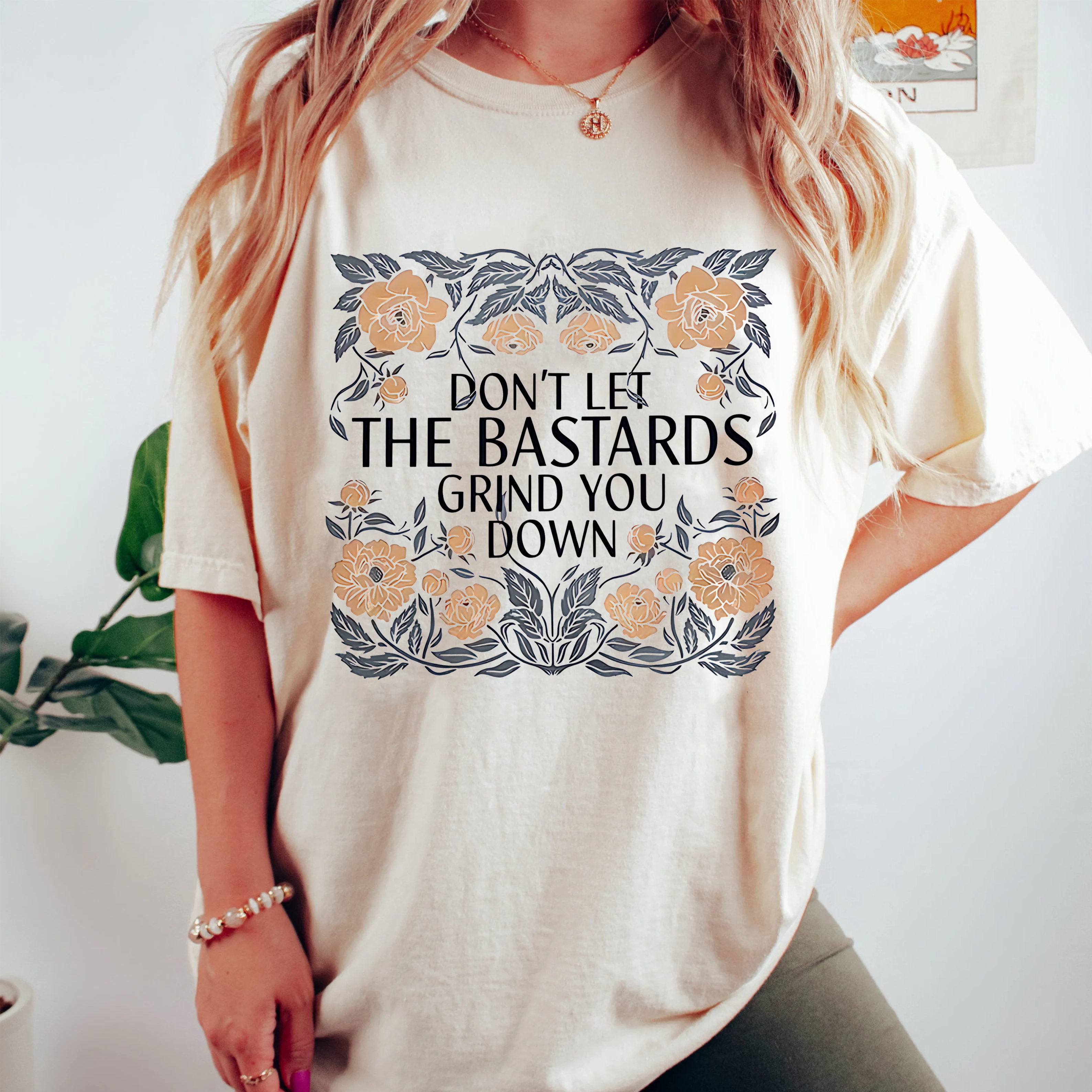 The Hand Maids Tale quote,DON'T LET THE BASTARDS GRIND YOU DOWN Unisex T-shirt