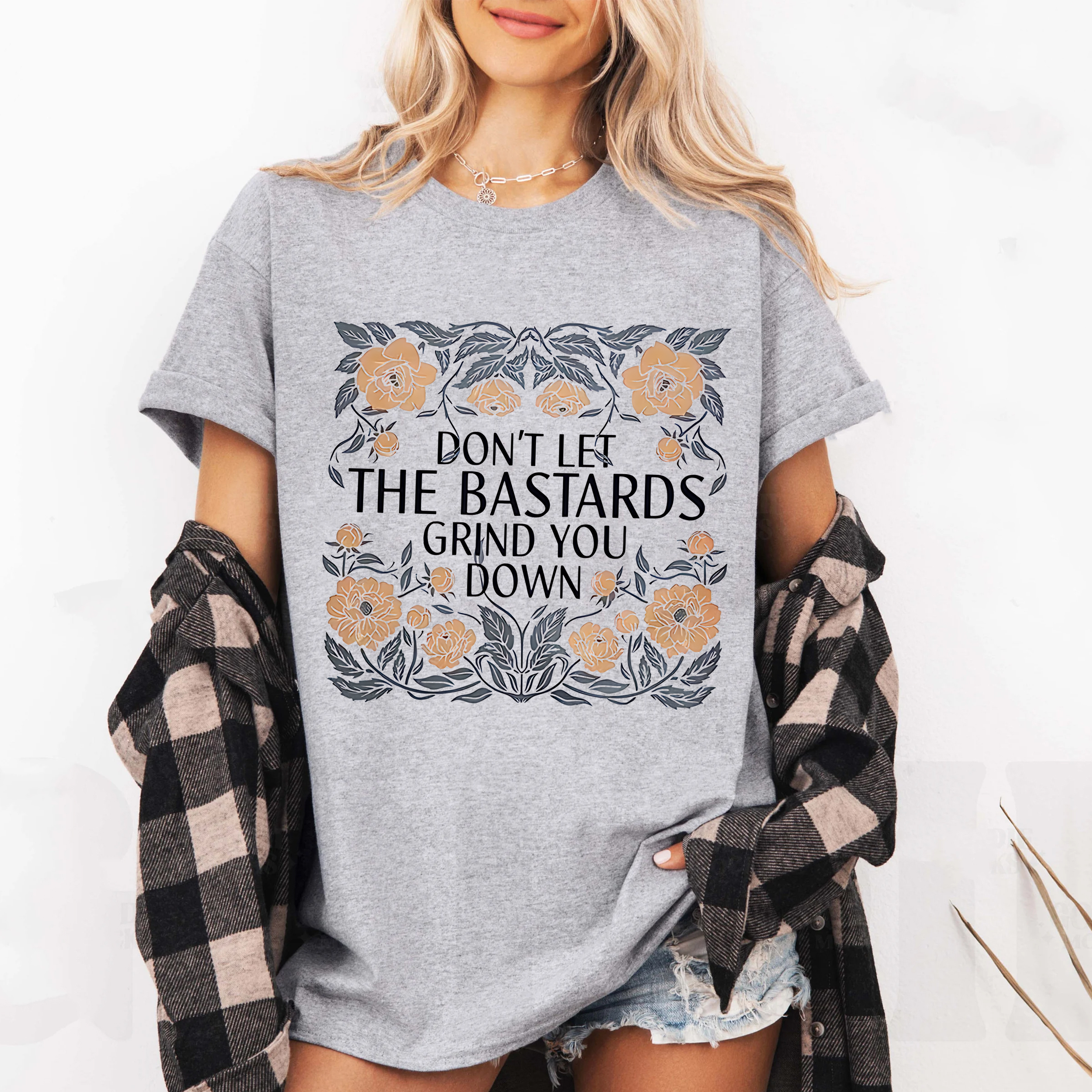 The Hand Maids Tale quote,DON'T LET THE BASTARDS GRIND YOU DOWN Unisex T-shirt