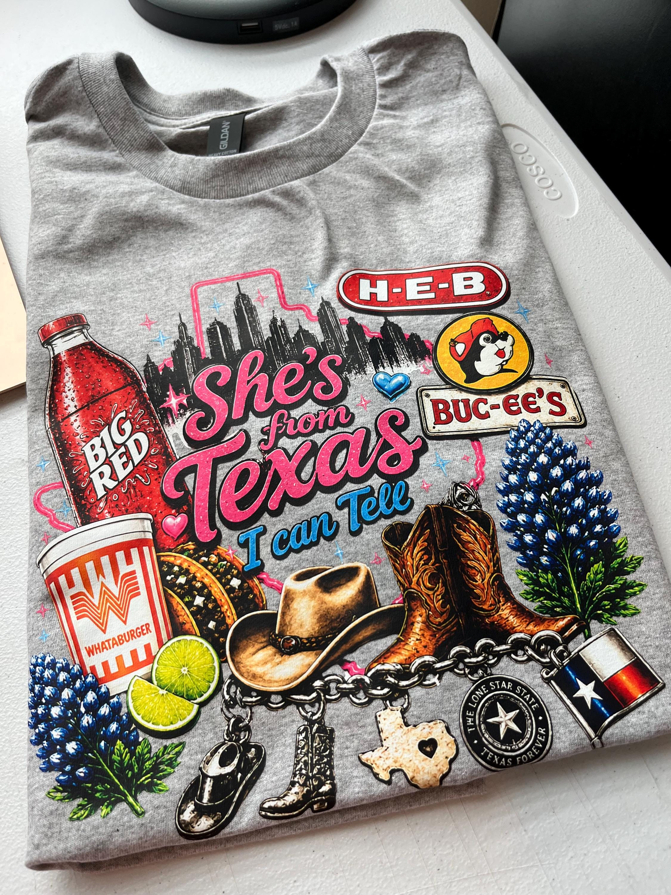 Shes from texas i can tell Unisex T-shirt