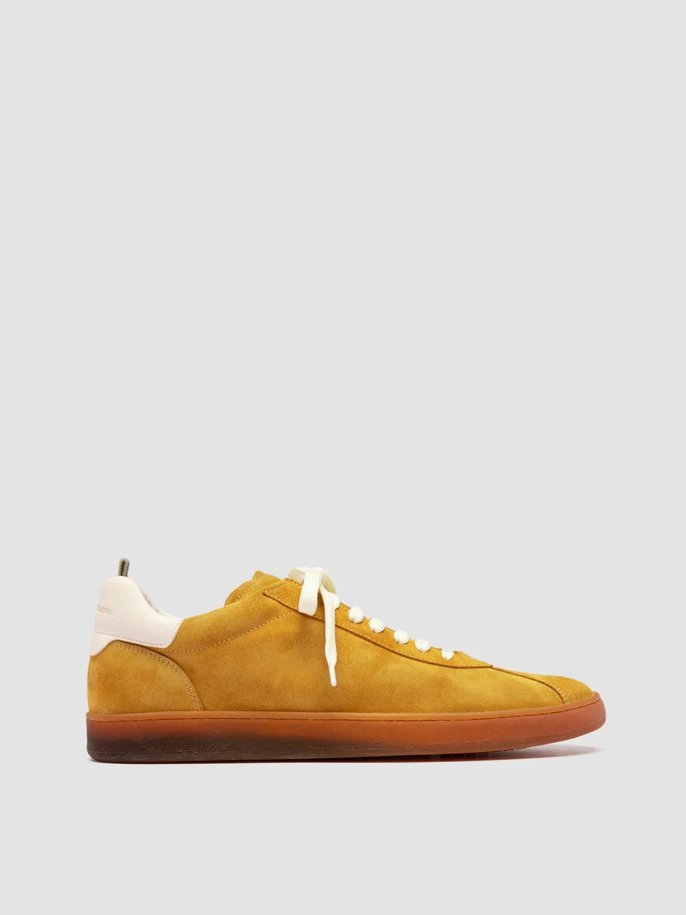 Gelbe Sneaker aus Leder und Wildleder