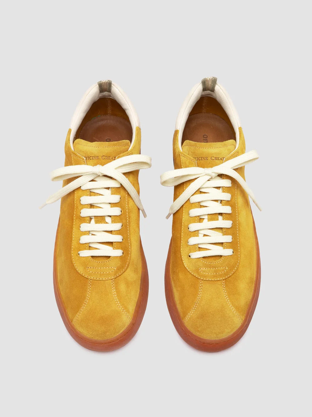 Gelbe Sneaker aus Leder und Wildleder