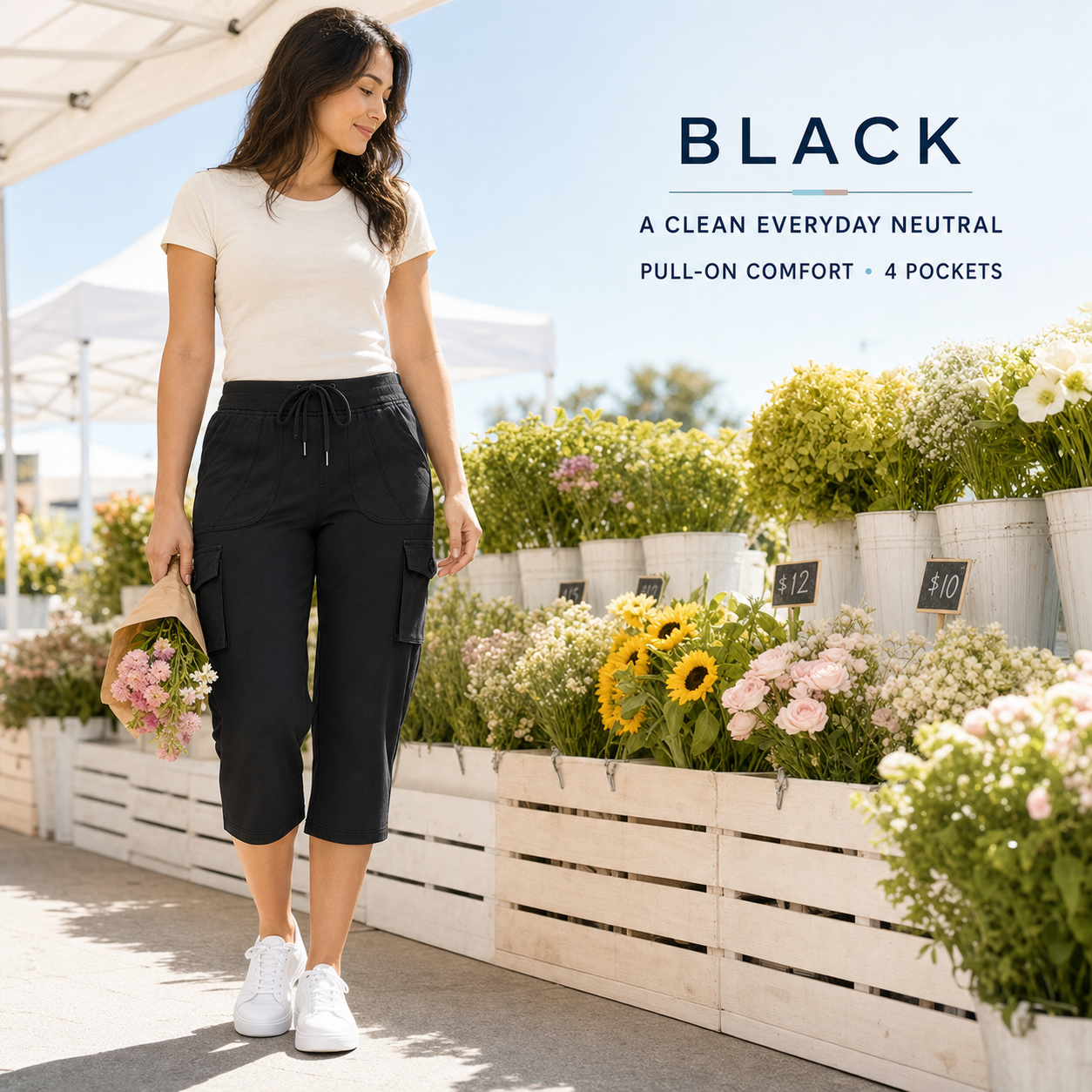 Black cargo capri pants at a bright cafe