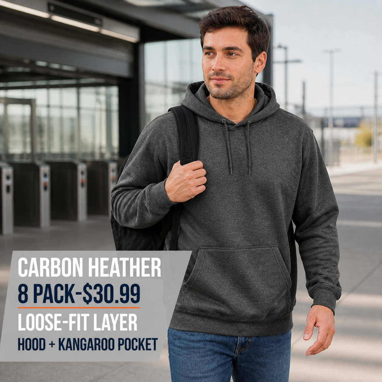 Carbon Heather men's loose-fit pullover hoodie during an urban commute