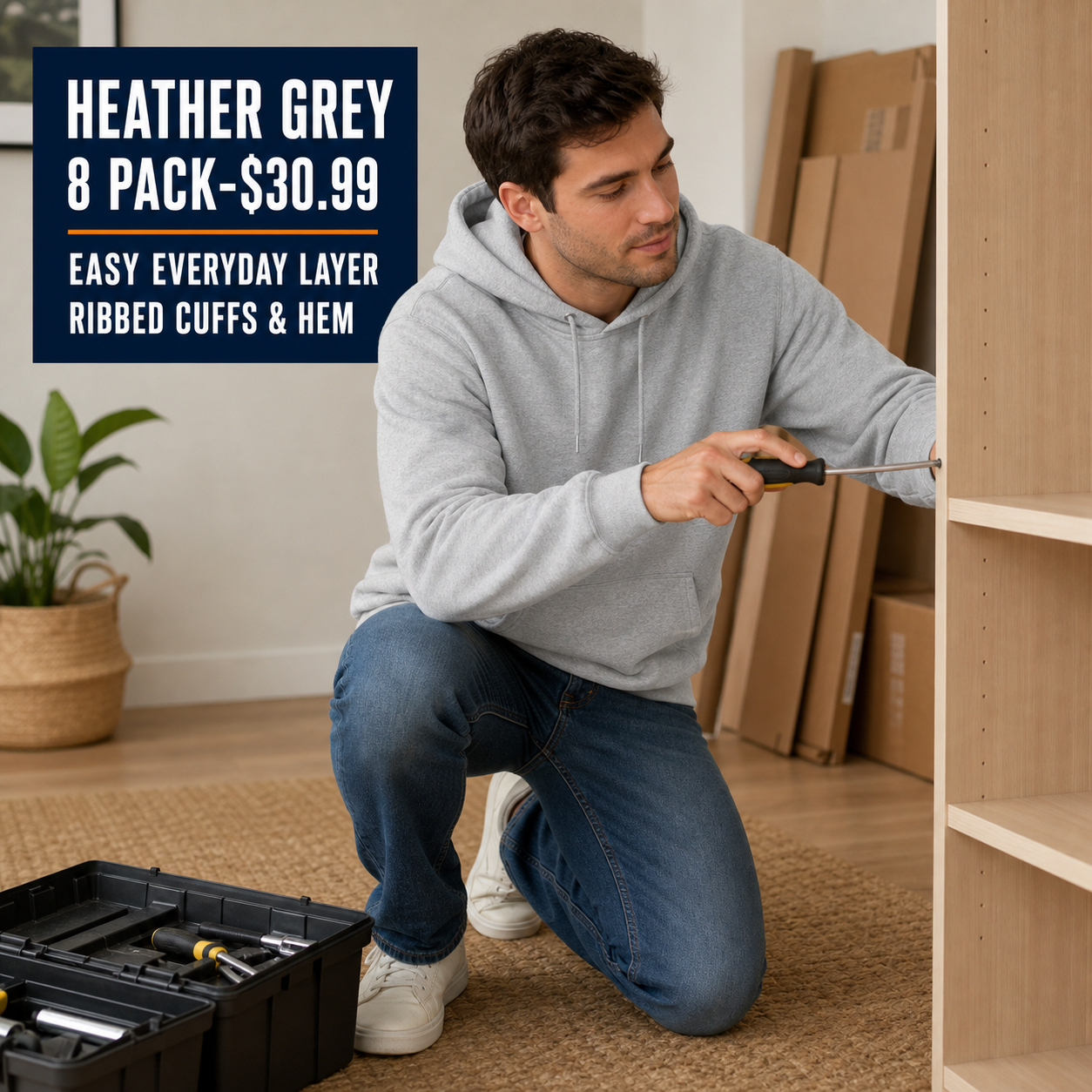 Heather Grey men's loose-fit pullover hoodie during a home project