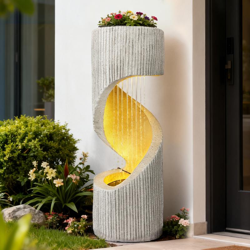 Fuente moderna con cascada de columna en espiral e iluminación LED para la decoración de jardines y patios.