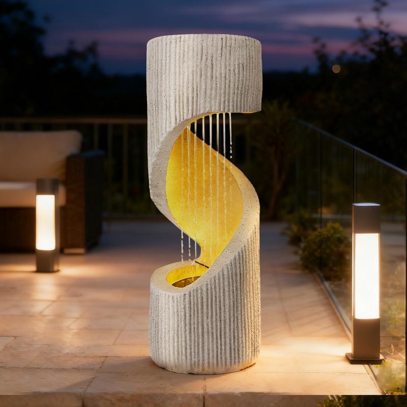 Fuente moderna con cascada de columna en espiral e iluminación LED para la decoración de jardines y patios.