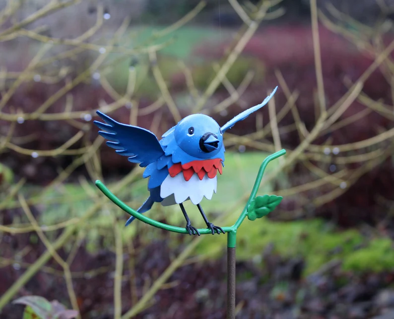 Goldfinch, Cardinal, Western Bluebird, Ruby-throated Hummingbird on a garden stake