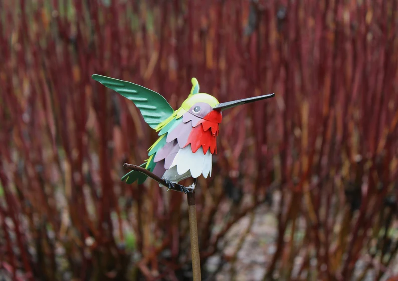Goldfinch, Cardinal, Western Bluebird, Ruby-throated Hummingbird on a garden stake
