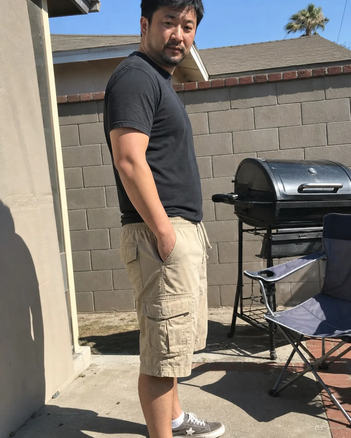 Khaki cargo shorts backyard side fit photo