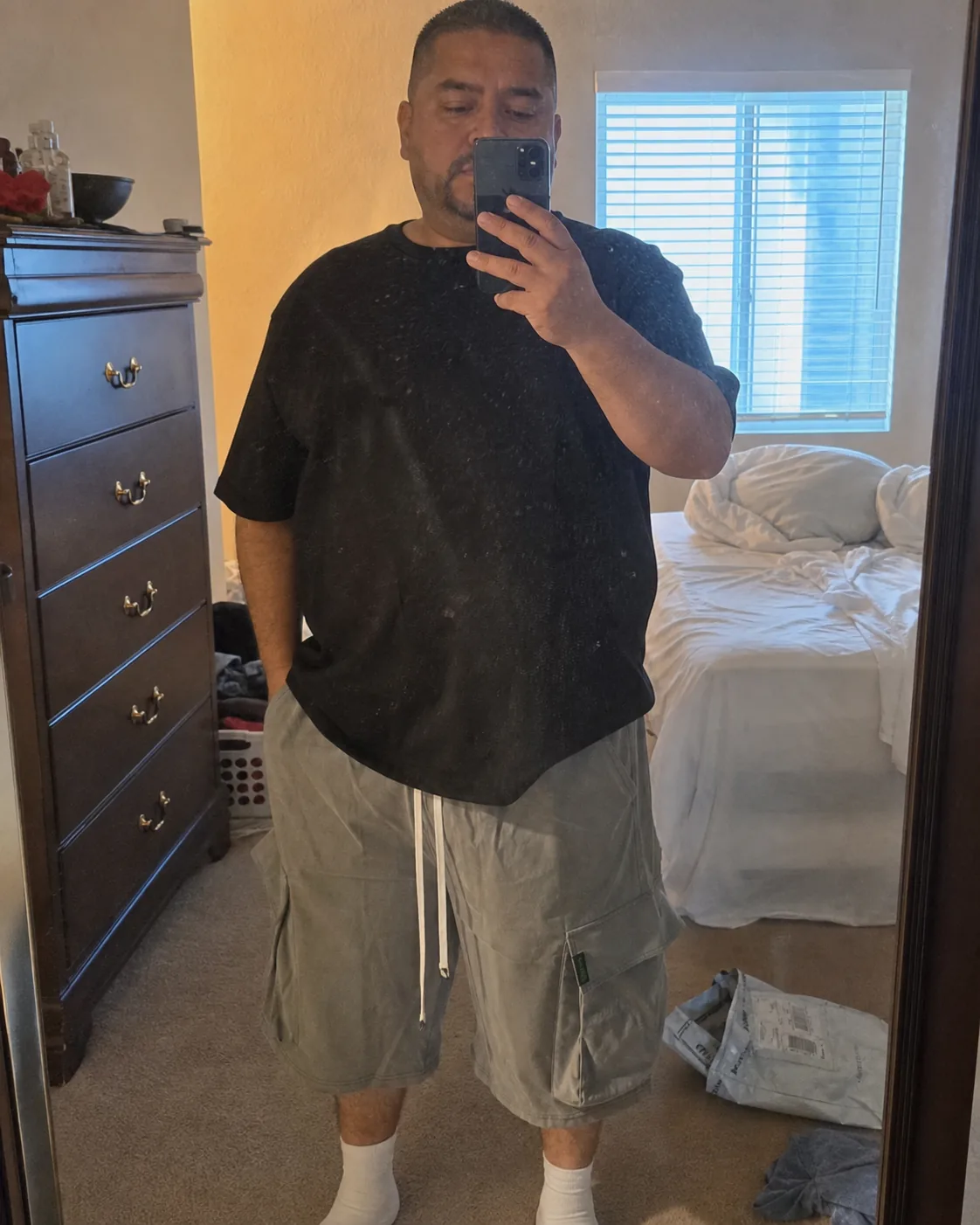 Gray plus-size cargo shorts bedroom mirror try-on
