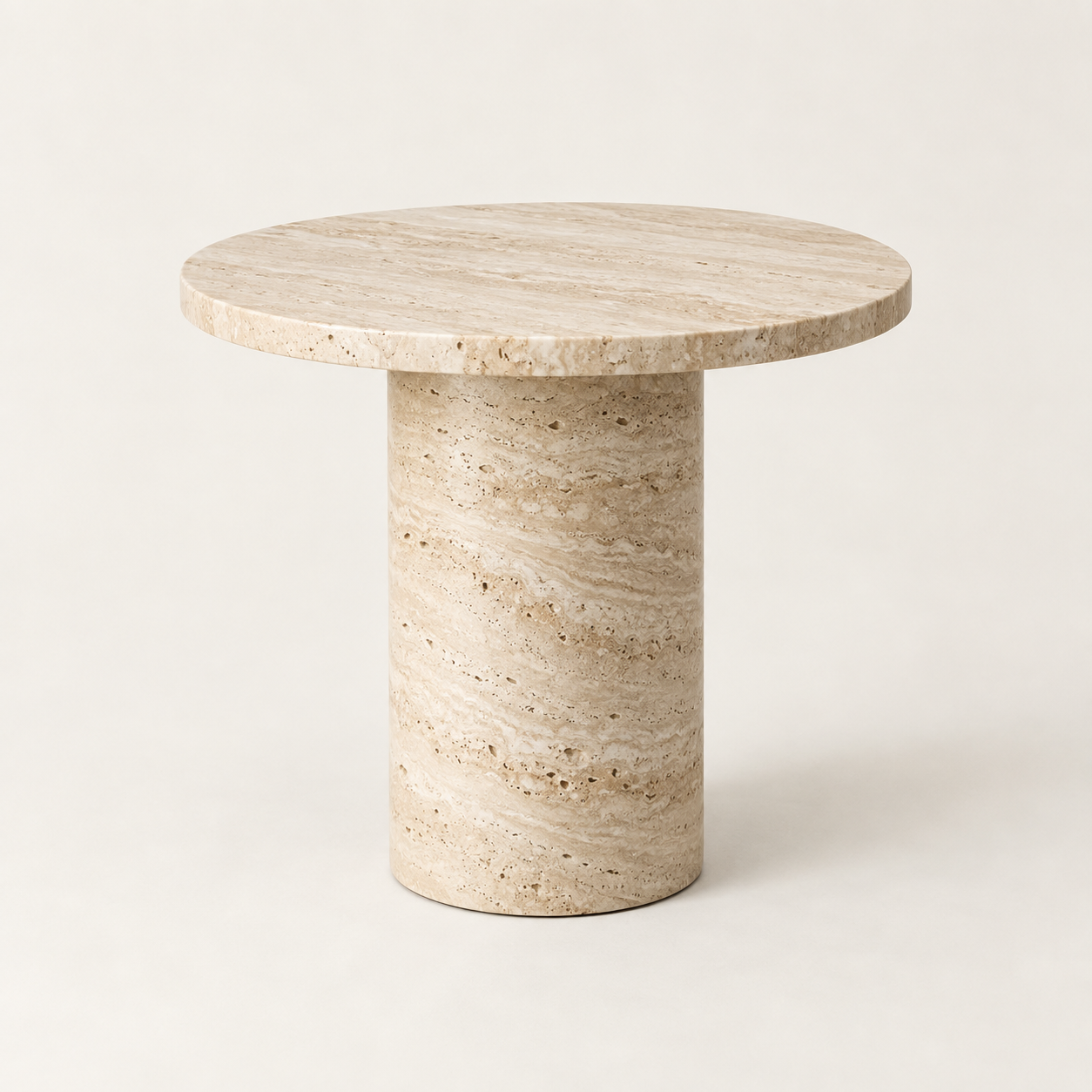 Alto Travertine Side Table on a warm neutral background