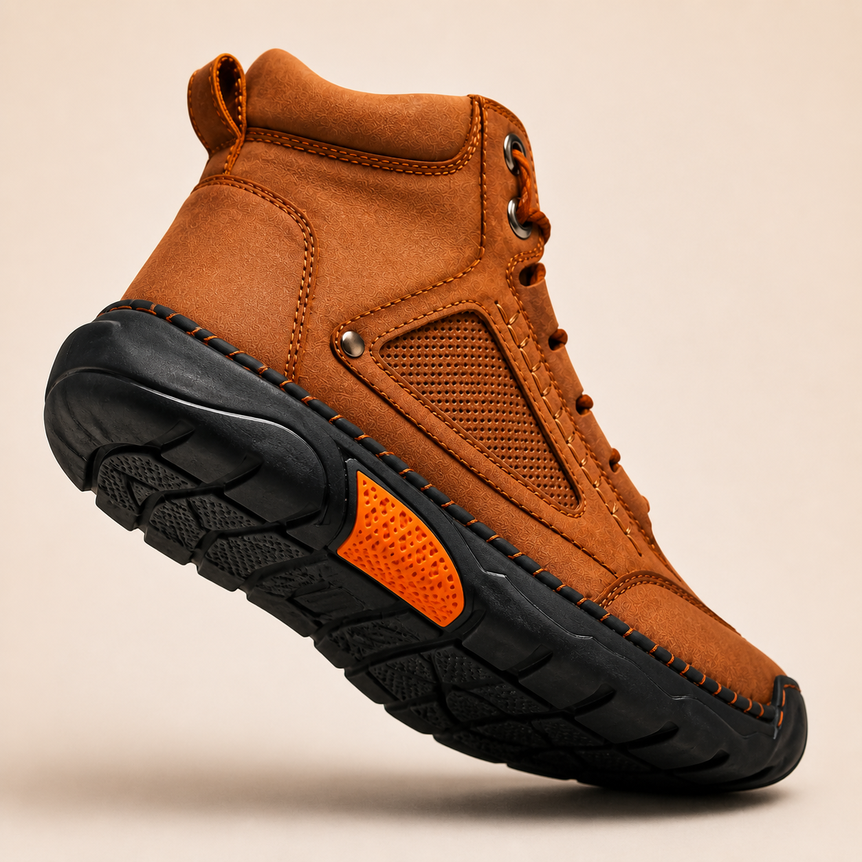 Textured rubber outsole and orange side insert detail