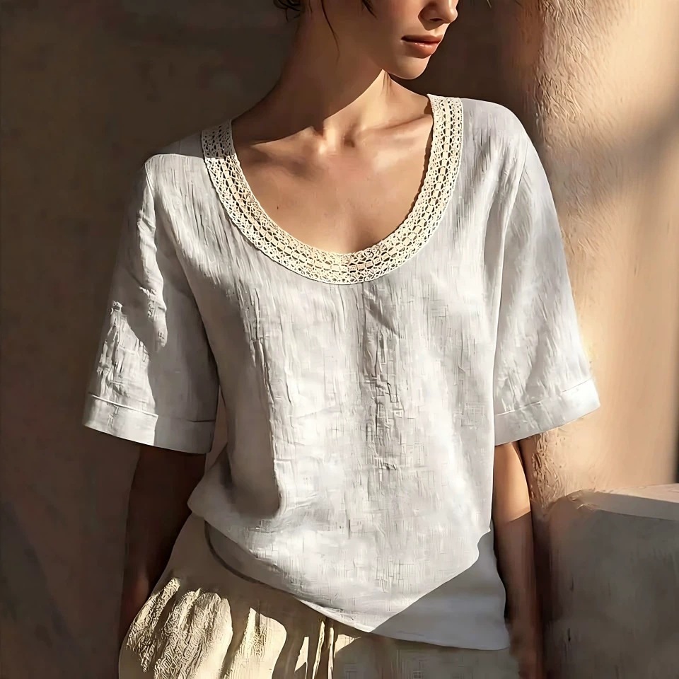 Vintage-style lace short-sleeve top with a U-neckline