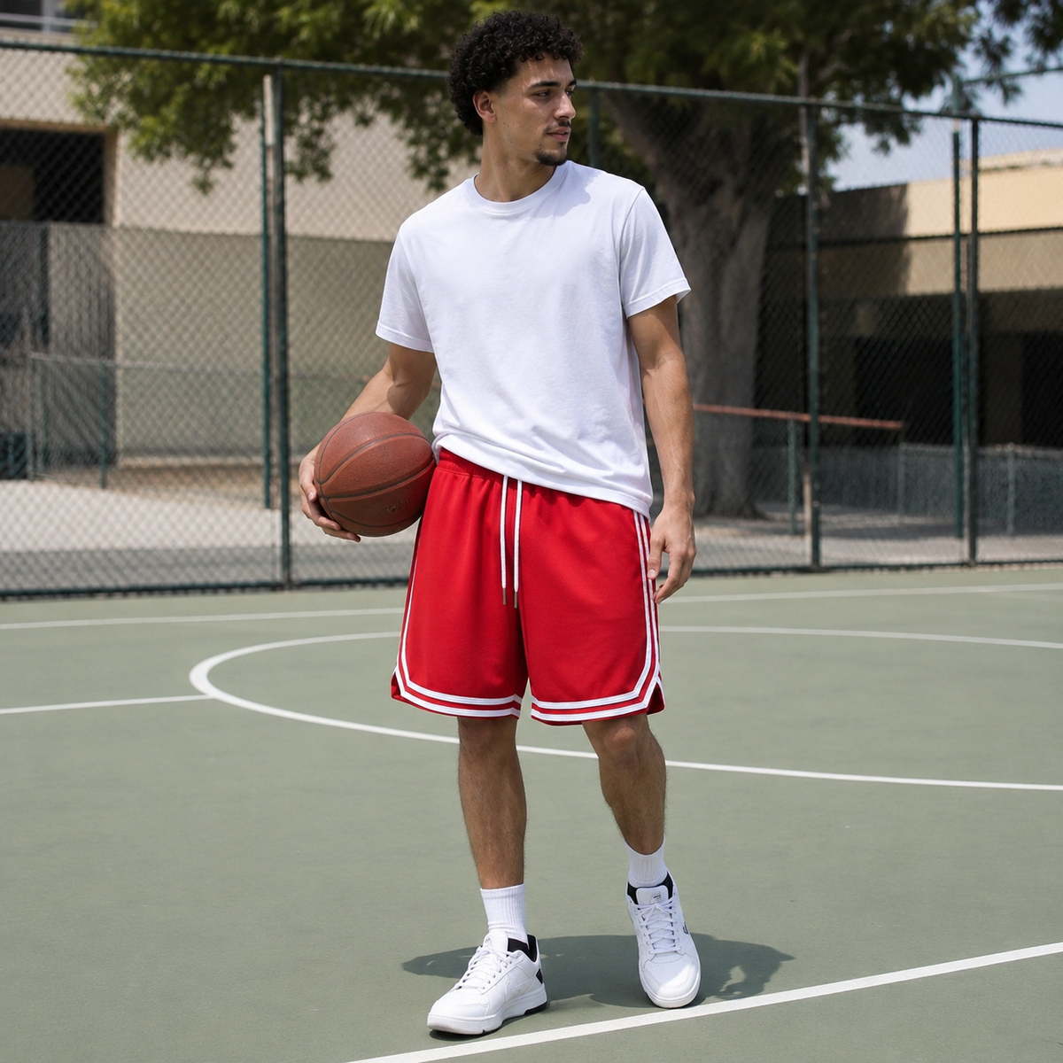 Retro mesh shorts worn on a basketball court