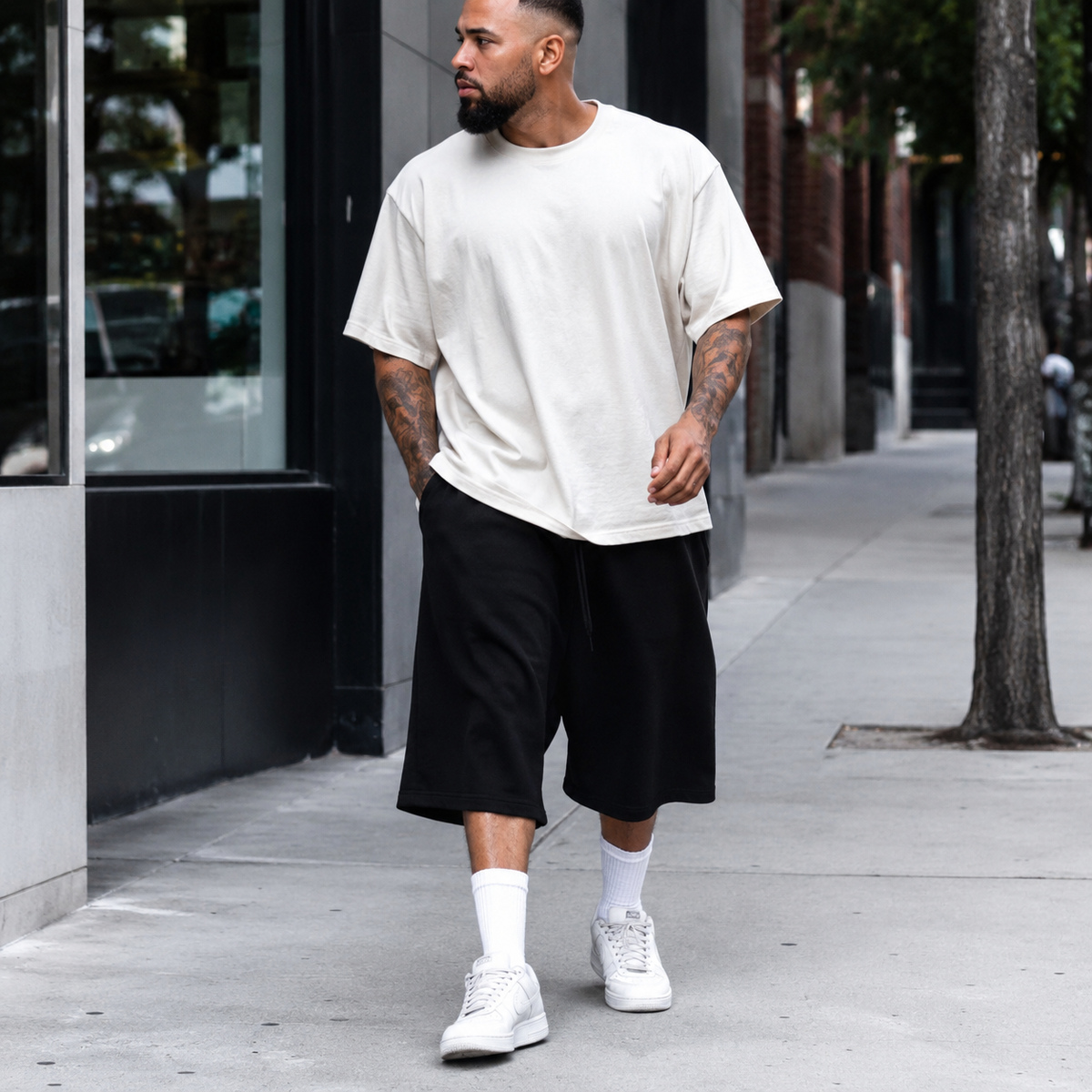 Baggy fleece shorts worn on a city street