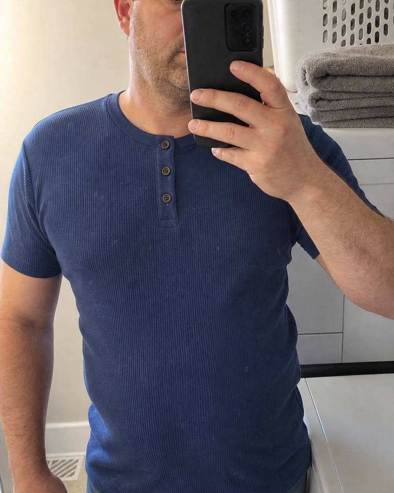 Ribbed knit Henley shown in a casual home mirror selfie