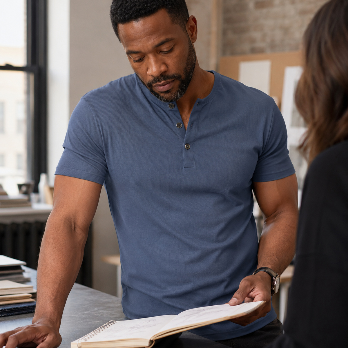 Slate blue ribbed Henley worn in a smart casual studio