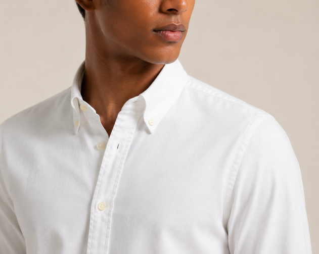 Cuff, curved hem, and shoulder seam detail