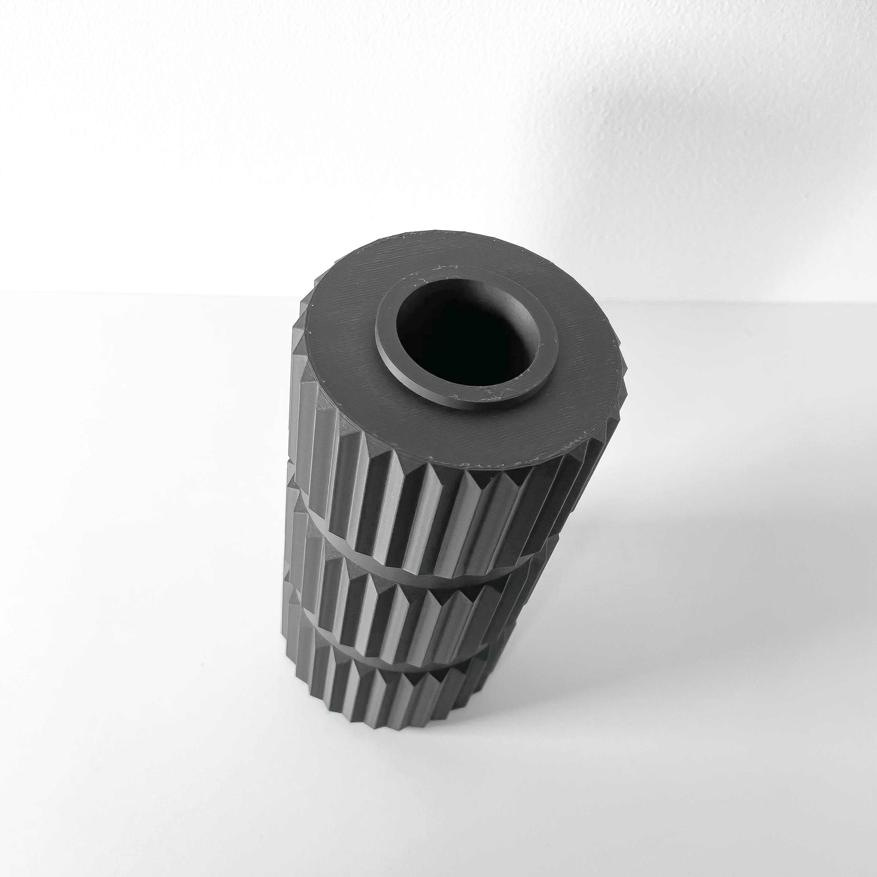 Black Geometric Decorative Vase with Vertical Ridges for Home Interiors