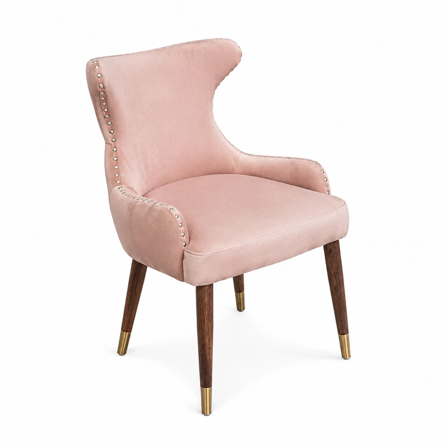 Silla de terciopelo rosa con patas de madera y detalles de latón