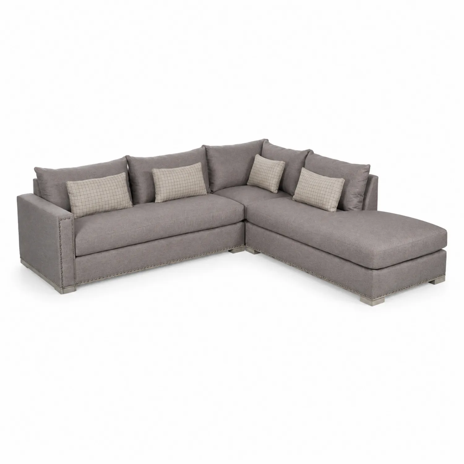 Canapé d'angle en tissu gris avec coussins