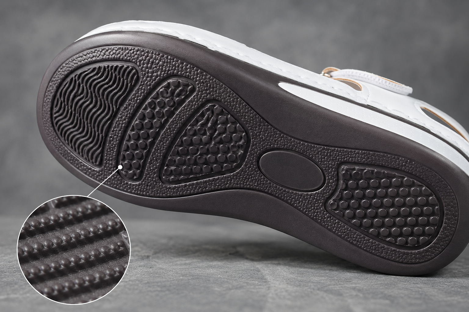 Suggested image: outsole close-up showing textured tread pattern on the bottom of the SEVINQ sandal