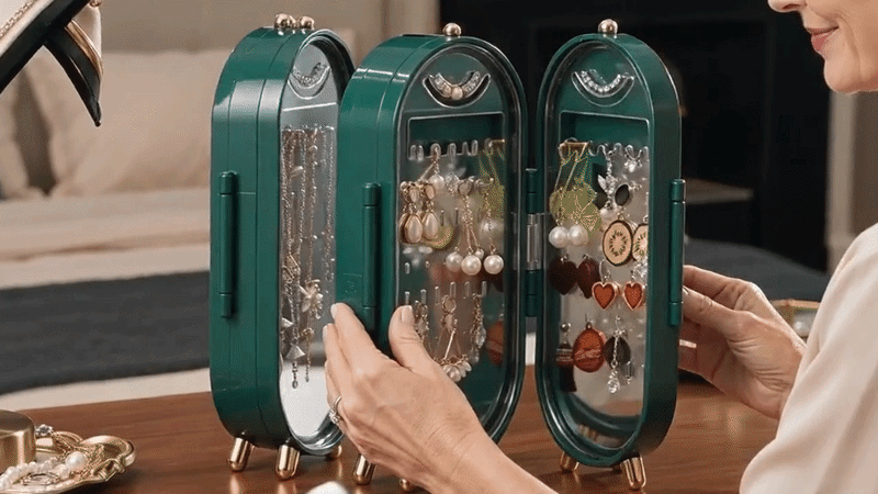 Suggested image: lifestyle hero showing the PAVAROA foldable jewelry storage box open on an elegant vanity, filled with earrings and necklaces