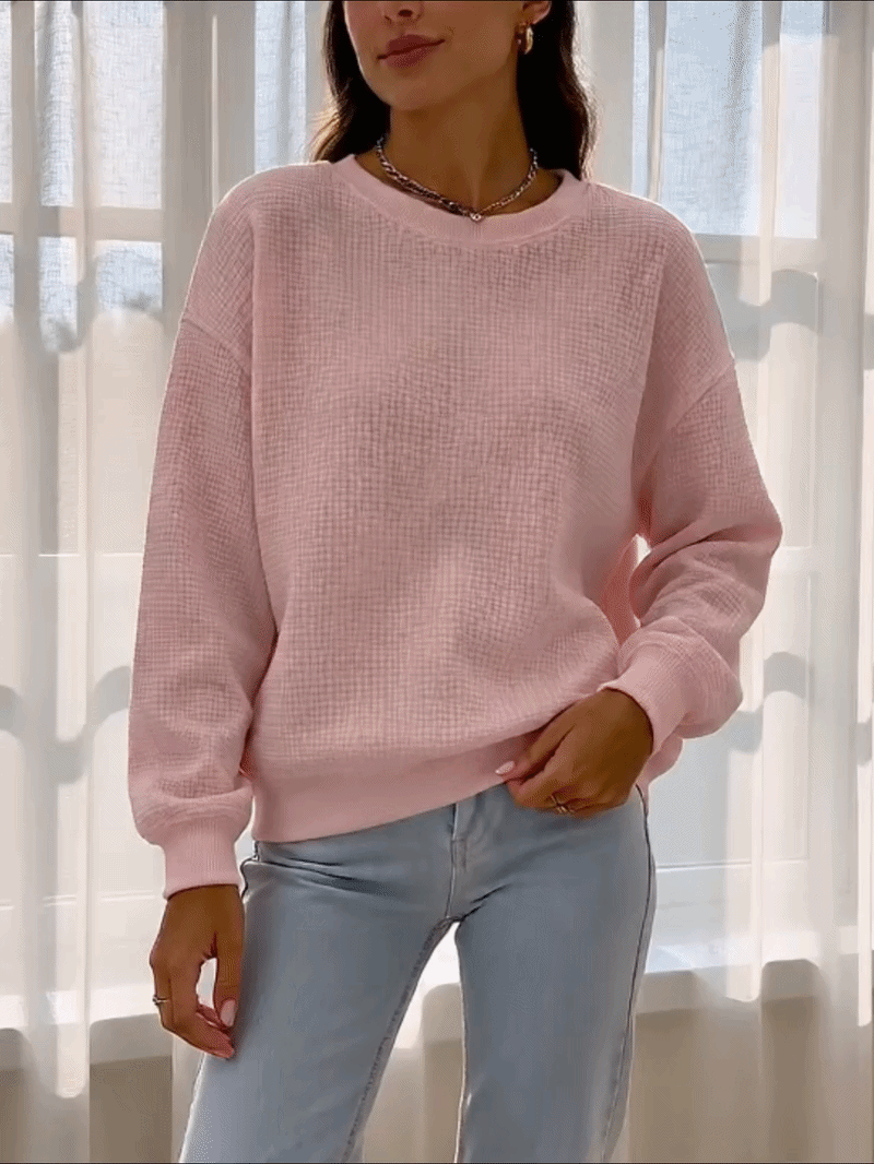 Suggested image or GIF: three-step styling sequence showing the waffle crewneck alone, with casual bottoms, and layered under a jacket