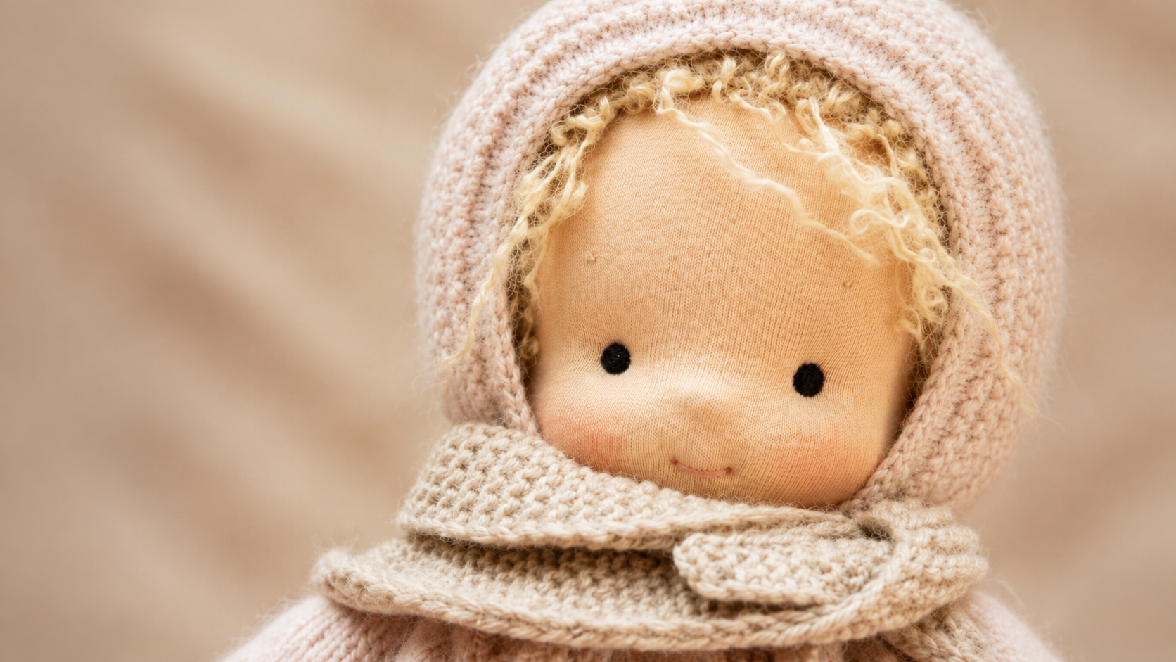 Suggested image: close-up of Serendity doll facial stitching showing the gentle neutral expression