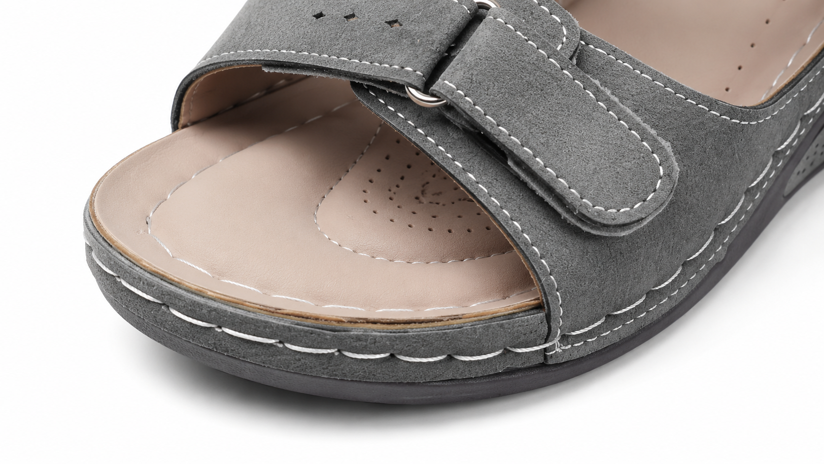 Suggested image: macro close-up of SEVINQ sandal footbed texture and cushion thickness
