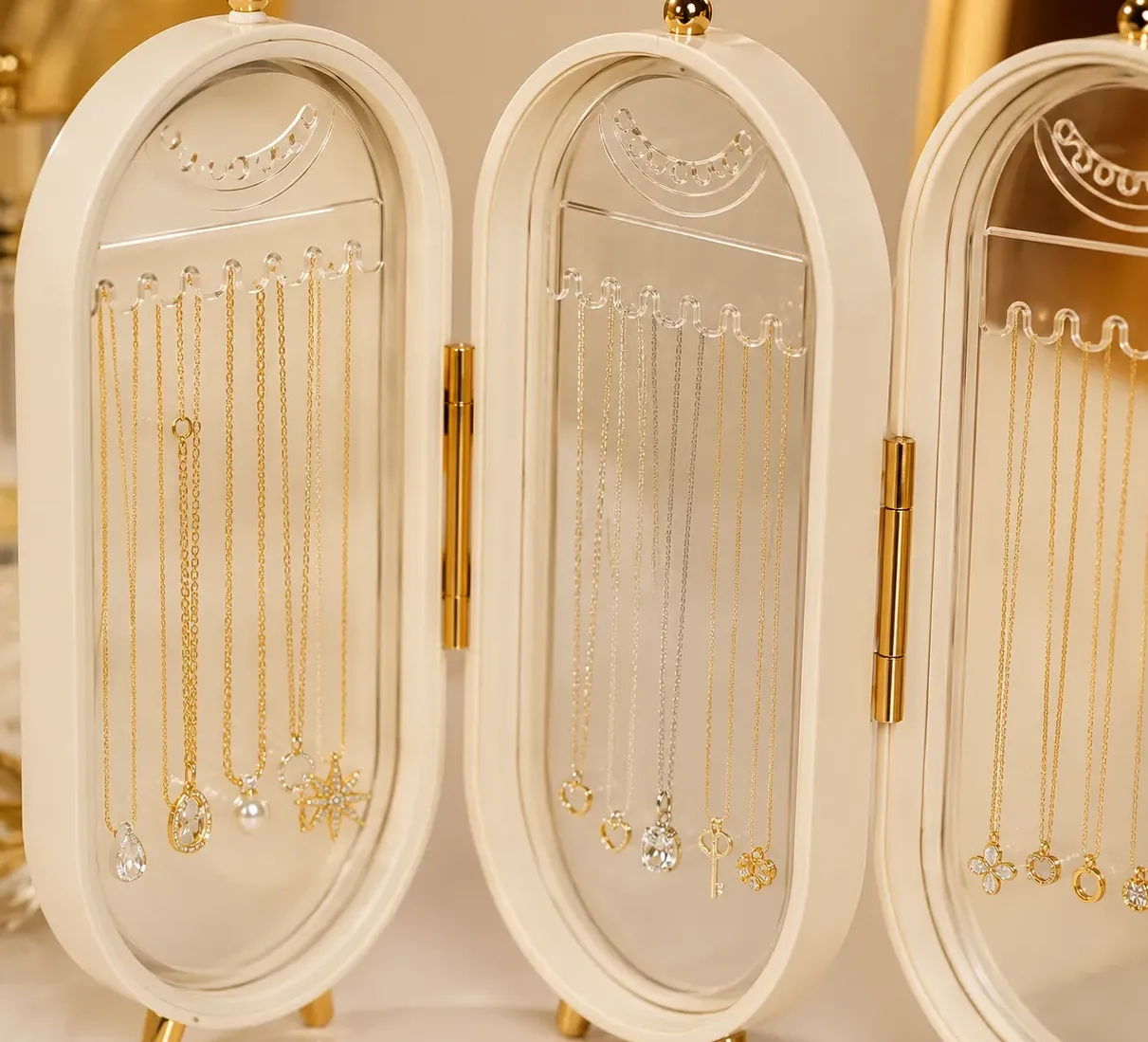 Suggested image: necklace storage panel showing separate chains hanging from individual slots without tangling