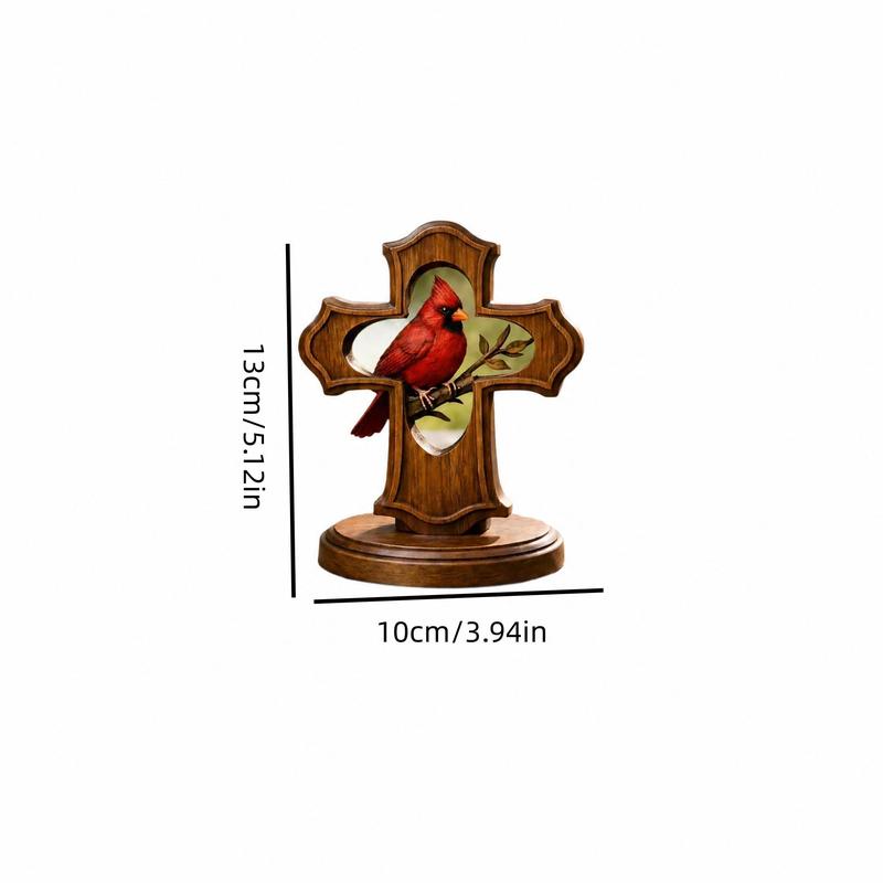 Close-up details of handcrafted cardinal cross ornament
