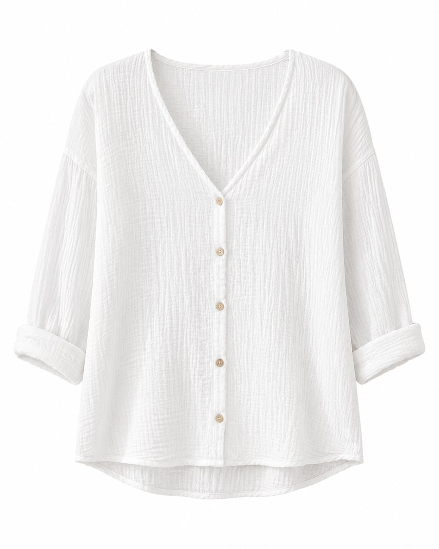 Front view of white textured V-neck button blouse