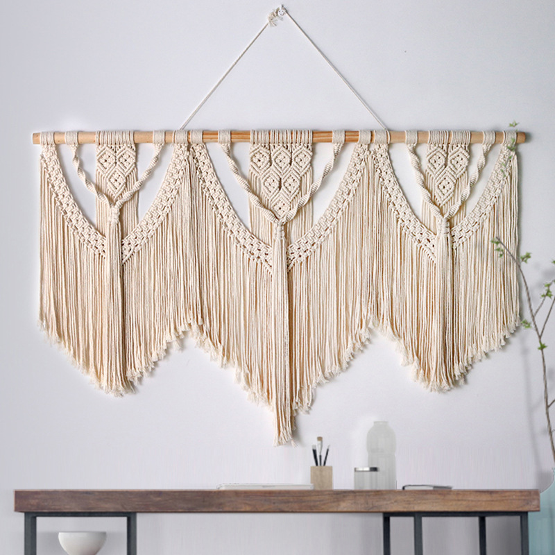 Amazon's new Bohemian tapestry, a simple decorative hand-woven tapestry with three removable curtain sections.