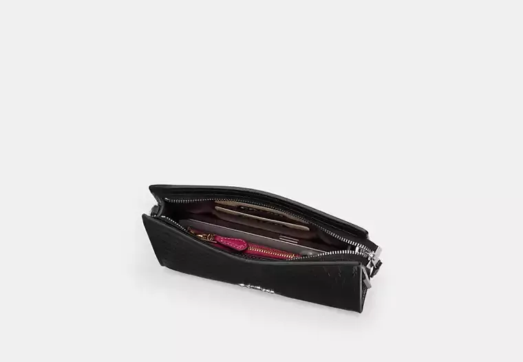 Slim Crossbody Bag In Signature Canvas With Floral Print