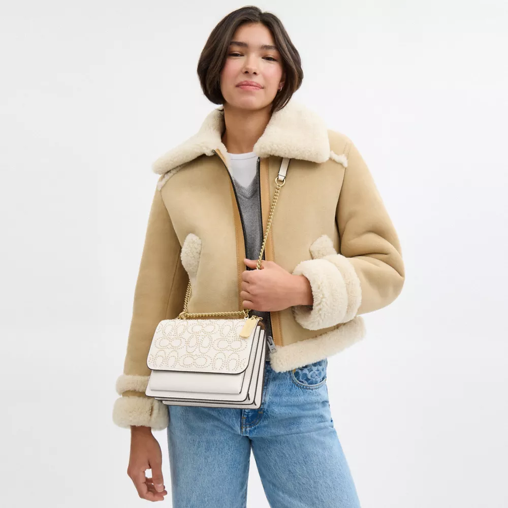 Klare Crossbody Bag With Signature Rivets