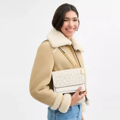 Klare Crossbody Bag With Signature Rivets