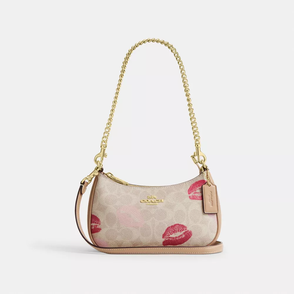 Teri Mini Crossbody Bag In Signature Canvas With Lips Print