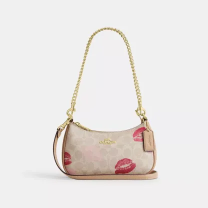 Teri Mini Crossbody Bag In Signature Canvas With Lips Print