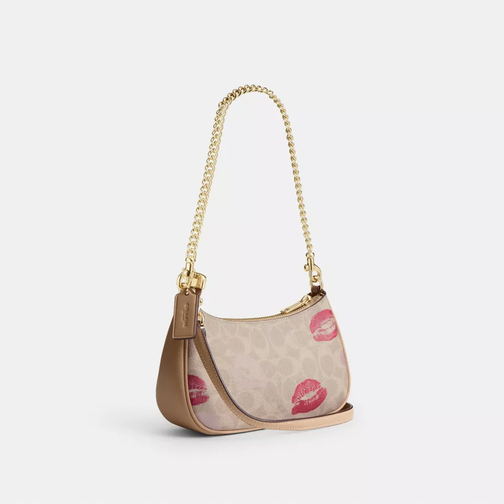 Teri Mini Crossbody Bag In Signature Canvas With Lips Print