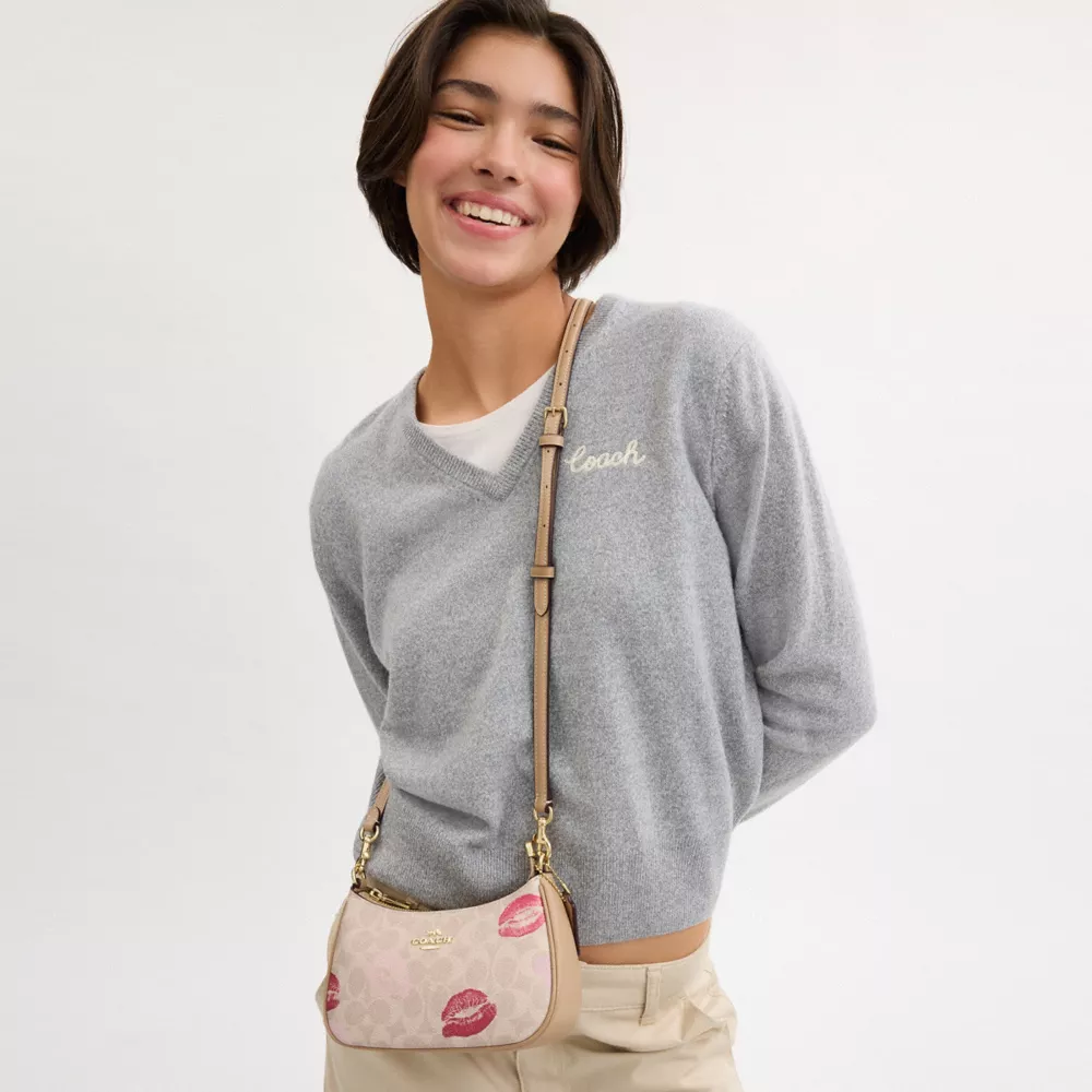 Teri Mini Crossbody Bag In Signature Canvas With Lips Print