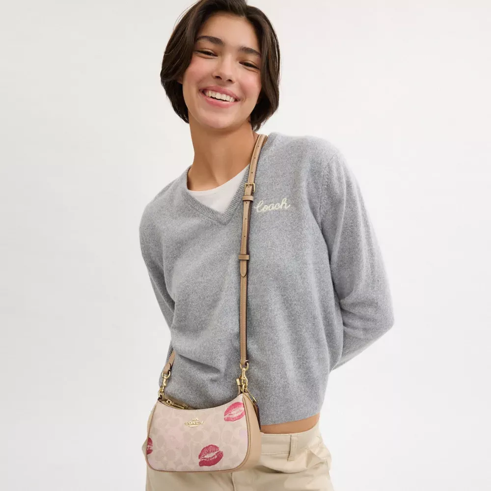 Teri Mini Crossbody Bag In Signature Canvas With Lips Print