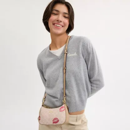 Teri Mini Crossbody Bag In Signature Canvas With Lips Print
