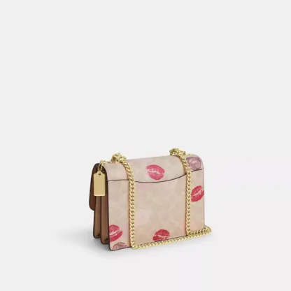 Klare Crossbody Bag In Signature Canvas With Lips Print