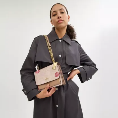 Klare Crossbody Bag In Signature Canvas With Lips Print
